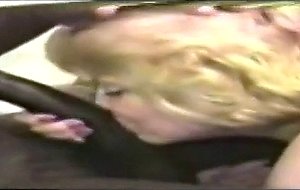 Blonde mom sucks a big black cock