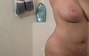 Super thick brunette takes a shower