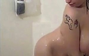 Super thick brunette takes a shower