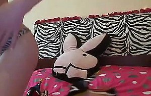 Slim blonde dolly does some softcore posing