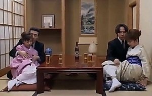 Japanese milfs sticks cock in her cunt next to other co