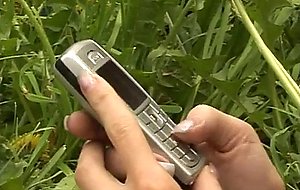 Solo teen masturbating outdoors on the floor