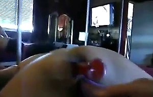 Milf takes toys in her brown fuck holes