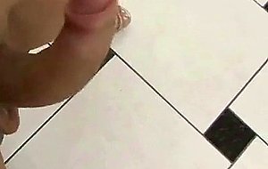 A sweet dark haired latina whore is jerking her cock off