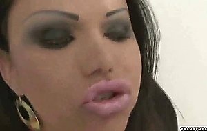 A sweet dark haired latina whore is jerking her cock off