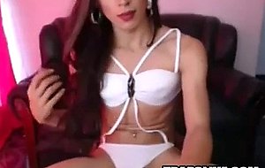 Sexy tgirl in heels jerks her cock