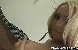 A honey tall blonde shemale jerks her cock