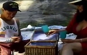 Pretty milf sucks cock and gets boned outdoors