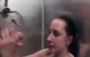 Horny brunette with a guy in the shower