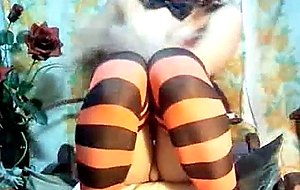 Tranny stroking her huge dick