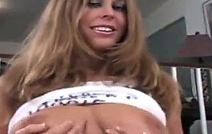 Pretty Carly puts a fat cock between her tits
