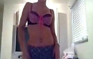 Young girls play in front of webcam