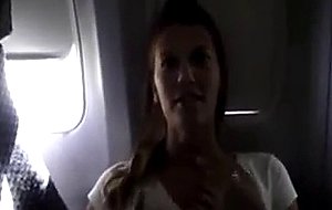 Masturbating her pussy in the airplane - free porn