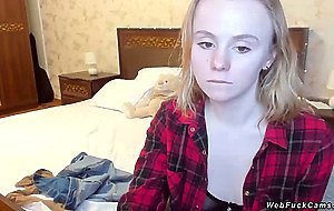 Blonde camgirl in shirt and black bra