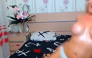 Busty Blond Sucking her Massive Dildo
