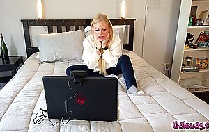 Lilly Bell doing a sexy striptease speaking into the camera