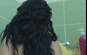 lovely teen having fun in the bathtub