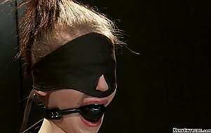 Blindfolded redhead gets punishment