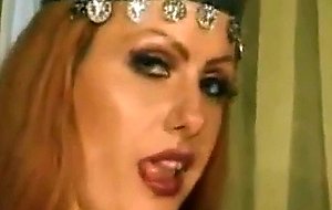Busty redhead amazon princess is serviced by her two fuck slaves