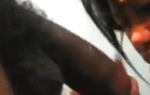 Asian milf deepthroats big black cock