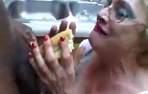 Old mom blows black cock in the...