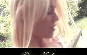 Blonde horny cat is posing honey in the garden