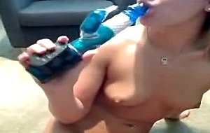 Blonde teen masturbating with blue dildo on the