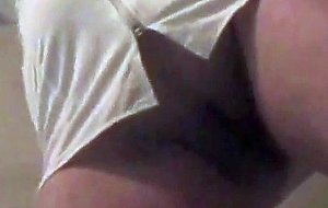 Sexy nurse dancing at home