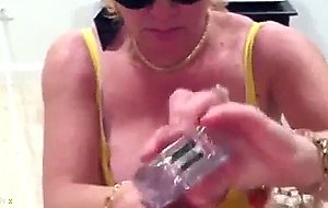 Mature busty woman jerking off a cock