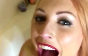 Redhead gf gives a head in bubble bath