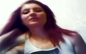 Sexy redhead babe teases on her live webcam