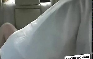 Asian older couple in the car