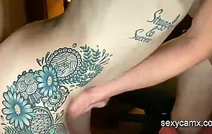 Busty MILF takes two cocks