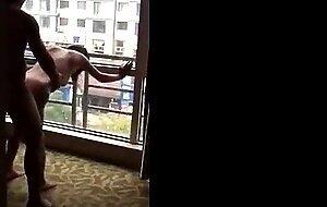 Filming his girl gets fucked at open window