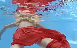 Hottest milf strips underwater