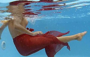Hottest milf strips underwater