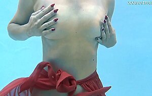 Hottest milf strips underwater