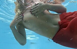Hottest milf strips underwater