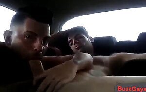 Latino Gay Couple's Steamy Car Blowjob