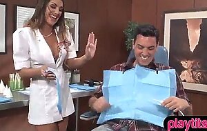 A busty dentist fucks with her patient to ease the