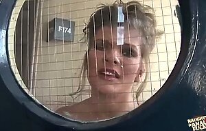 Big tits blonde is being locked in the bathroom and fucked by two huge rods