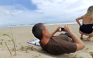 A fat dick in the ass perked up a milf dozing on the beach!