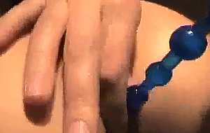 Amateur couple decide to use anal beeds, and this bitch is a screamer