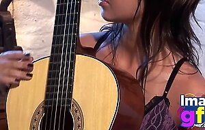 Hot Paul showing her medium tits and pussy with guitar