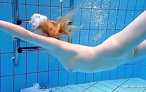 Big tits teen Lucie in the pool