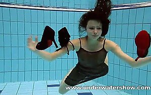 She enjoys swimming with her big...