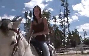 Toplessteenonhorseback