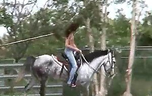 Toplessteenonhorseback