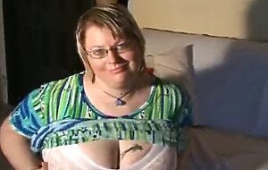 Horny amateur squizing her huge breasts and teasing