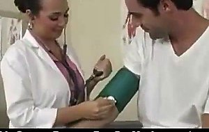 Sexy brunette doctor in her office